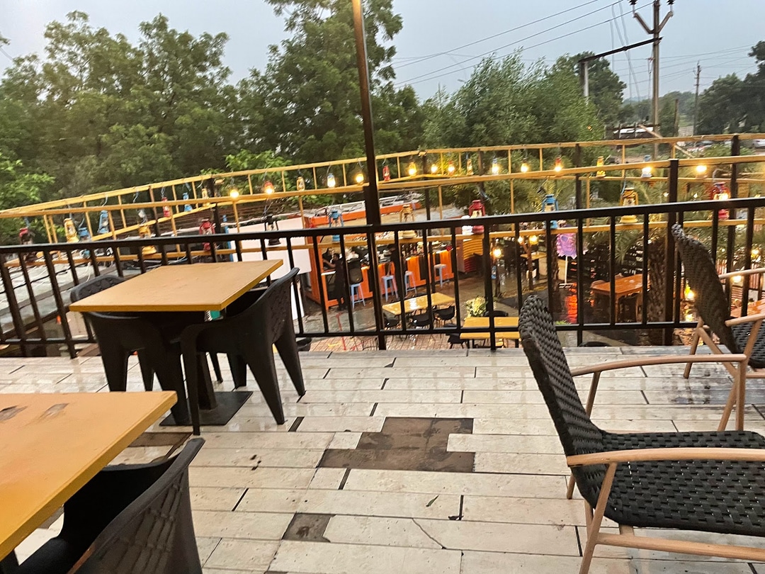 The RUSTIK CAFE & RESTRO | BEHIND KARNAVATI CLUB ROAD. MUMATPURA ROAD | AHMEDABAD