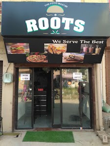 Roots Cafe Momos Burger Sandwich pasta Shakes Pizza Derabassi